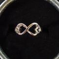Bague neuve plaqué argent grandeur 8 10$